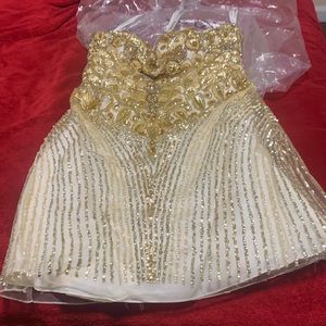 I am selling a one time use Sherry Hill Prom dress